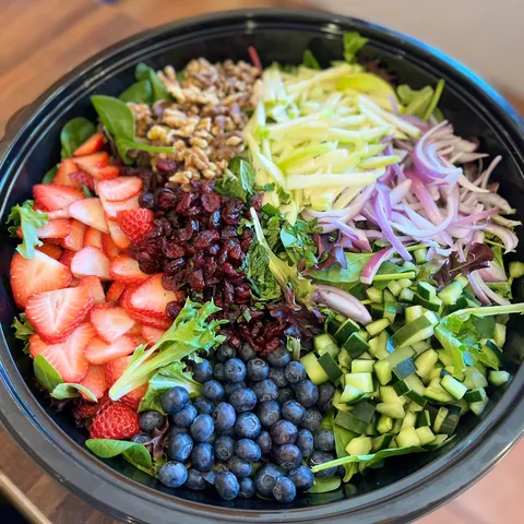 Antioxidant salad from above: strawberries, blueberries, walnuts, apple, cucumber and greens