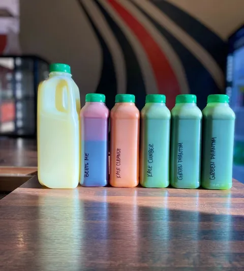 Bottled juices lined up on the counter